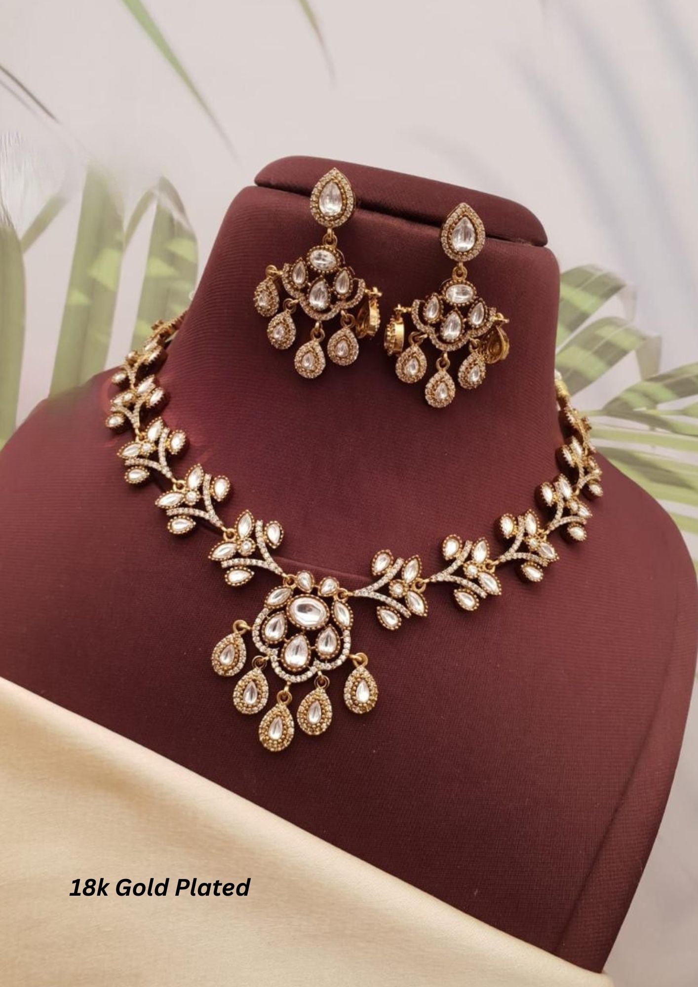 Kundan stone gold plated necklace with earrings