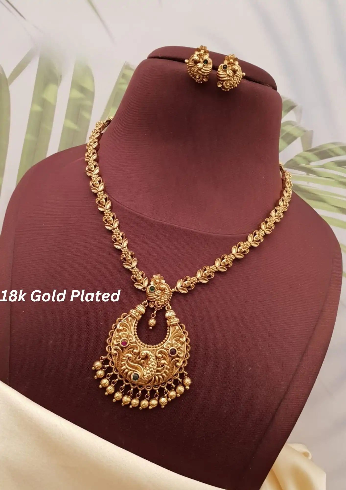 Kundan stone gold plated necklace with earrings