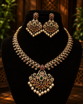 Kundan stone gold plated necklace with earrings